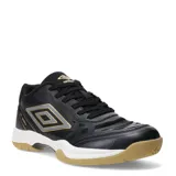 Championes de fútbol sala Umbro modelo Grip Pad, color negro con detalles en dorado y blanco. Presentan una suela de goma color caramelo diseñada para superficies de interior, con refuerzos en la puntera y laterales para mayor durabilidad.