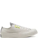 Championes Converse Renew Chuck 70 color beige con detalles en gris y verde flúor.