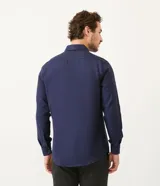 Camisa de vestir Preston Field modelo classic, de manga larga y diseño liso. Cuenta con cuello camisero y cierre frontal con botones al tono.