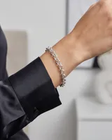 Pulsera de eslabones tipo rolo fabricada en plata 925, con diseño clásico y acabado brillante.