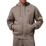 Campera con capucha y cierre frontal completo, confeccionada en tejido fleece color marrón. Presenta bolsillos tipo canguro y el logo de Jordan bordado en el pecho.