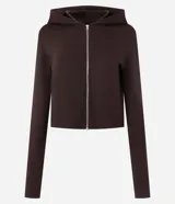 Campera corta con capucha fija, cierre frontal con cremallera y mangas largas, confeccionada en tejido modal con acabado satinado.