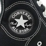 Championes Converse Chuck Taylor All Star Construct de caña alta, color negro y blanco, con plataforma y logo de la marca en el lateral.