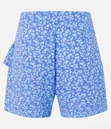 Short pollera de viscosa con estampado floral liberty, corte mini y volado delantero.