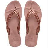 Sandalias tipo ojota Havaianas con tiras finas metálicas y suela de goma texturizada.