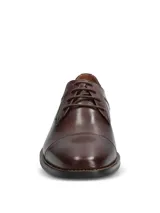 Zapato de vestir formal Hush Puppies modelo Jazz, confeccionado en cuero vacuno color marrón con diseño de puntera reforzada y cierre mediante cordones.