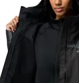 Campera impermeable de mujer Columbia modelo Whistler Peak Shell OutDry, en color negro con detalles reflectantes y costuras selladas. Cuenta con capucha ajustable, cremalleras frontales y laterales de poliuretano, y aberturas de ventilación.