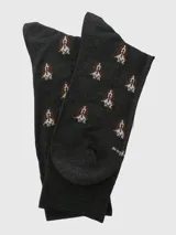 Calcetín de corte medio color gris oscuro con estampado de perros pequeños en tonos marrones y blancos.