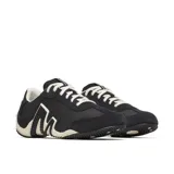 Zapatillas de perfil bajo con diseño retro, confeccionadas en una combinación de gamuza y malla transpirable. Presentan un diseño lateral distintivo con textura de puntos y suela de goma con refuerzo en el talón.