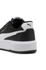 Championes Puma Carina Mia, color blanco con franja lateral en tono menta y suela de plataforma con textura acanalada.