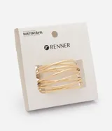 Pulsera rígida tipo brazalete de metal dorado, con diseño abierto y estructura de múltiples varillas paralelas que se entrelazan de forma asimétrica.