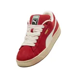 Championes Puma Suede XL de gamuza en color azul, con franja lateral blanca y suela de goma blanca.