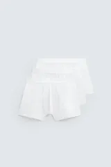 Pack de tres calzoncillos tipo bóxer azul marino de algodón con cintura elástica.