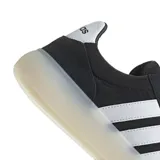 Championes Adidas Bareeda Decode negros con las tres tiras blancas y suela color crema.