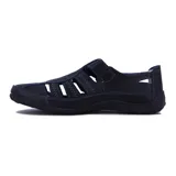 Guillerminas casuales de cuero sintético negro, con suela baja y ajuste con velcro.