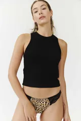 Colaless con estampado de cebra y detalle de encaje negro en los bordes.