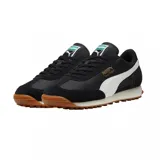 Championes urbanos Puma modelo Easy Rider Vintage, color negro con detalles en blanco y suela de goma color caramelo. Presentan una combinación de materiales en la capellada con logo de la marca en el lateral y lengüeta.