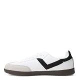 Championes urbanos Pony modelo Moma, color negro con detalles en blanco. Presentan un diseño retro con puntera de gamuza, cuerpo de material sintético y suela de goma color marrón.