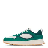 Championes urbanos Under Armour modelo Mirage Sport, con diseño en capas de color verde y blanco. Presentan una entresuela gruesa de color crema y suela de goma color caramelo, con el logo de la marca en el lateral y la lengüeta.