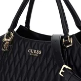 Bolso de mano Guess modelo Valla, color negro, con textura acolchada en patrón de rombos. Presenta asas de hombro y herrajes metálicos dorados, incluyendo un dije colgante con el logo de la marca.