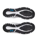Championes de running Under Armour, color azul marino con logo blanco en el lateral y suela blanca con tecnología Charged Cushioning.
