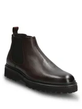 Botas chelsea Hush Puppies modelo Fort, color marrón oscuro, confeccionadas en cuero con paneles elásticos laterales y suela track de EVA.