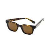 Lentes de sol con armazón de acetato en estampado carey y cristales marrones. Presentan un diseño de marco cuadrado con patillas gruesas.