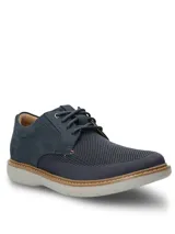 Zapato de estilo casual Hush Puppies, modelo Bangu, con diseño híbrido que combina cuero nobuck en el talón y laterales con tejido técnico transpirable en la parte frontal. Cuenta con cordones, suela de EVA flexible y costuras decorativas en el borde de la suela.