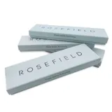 Reloj Rosefield modelo The Boxy XS con caja cuadrada de acero dorado y esfera blanca con función de fecha. Malla bicolor en tonos plata y oro.