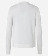 Cardigan de punto fino color gris, con escote en V, cierre frontal con botones y mangas largas. Confeccionado en una mezcla de viscosa y poliamida.