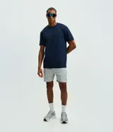 Remera deportiva Get Over de color azul marino, confeccionada en tech fleece con tecnología dry de secado rápido, cuello redondo y manga corta, de corte holgado.