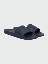 Sandalias tipo slide de la marca Boss, color azul marino, con banda ancha superior que presenta el logo de la marca en relieve.