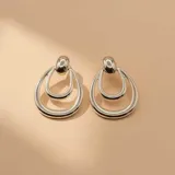 Caravanas de plata 925 con diseño de doble aro ovalado y cierre de perno.