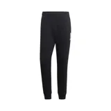 Pantalón de chándal negro Adidas de corte slim fit, con cintura elástica y puños ajustados. Presenta un logo estampado en la pierna izquierda.