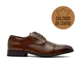Zapato de vestir tipo oxford de cuero color marrón, con cordones y puntera reforzada.