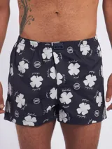 Bóxer Kevingston de algodón blanco con estampado integral de labios rojos. Cuenta con cintura elastizada y etiqueta de la marca en el frente.
