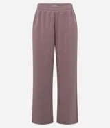 Pantalón de corte recto con cintura elástica y lazo de ajuste frontal. Confeccionado en tejido modal con caída fluida y estructura cómoda.