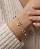 Pulsera de plata 925 con cadena de eslabones y dijes colgantes circulares decorados con circonias blancas pavé.