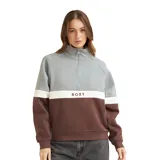 Buzo Roxy de cuello alto con cierre frontal parcial, diseño de bloques de color en gris, blanco y marrón, con logo bordado en el centro.