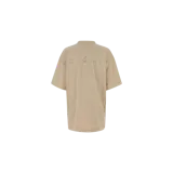 Remera Balenciaga oversize de manga corta en color beige, con cuello redondo y el logotipo de la marca escrito con brillos en la parte trasera.