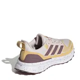 Championes de running Adidas Ultra Run 5 TR W para mujer, diseñados para terrenos mixtos. Presentan una combinación de colores beige, crema y detalles en violeta oscuro. Cuentan con tecnología de amortiguación Bounce en la mediasuela, suela Adiwear para mayor tracción y un acabado repelente al agua en el exterior.