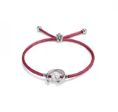 Pulsera de hilo color malva con perla shell y fornitura bañada en plata de ley.