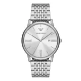 Reloj de pulsera analógico con caja de acero inoxidable y malla de eslabones plateada. Presenta una esfera minimalista en tono plateado con acabado sunray, índices de bastón, números romanos en posiciones clave, ventana de fecha y el logo de la marca en la parte superior.
