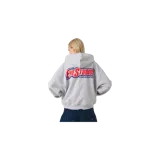 Hoodie oversized gris melange de Eme Studios, con capucha, bolsillo tipo canguro y gran estampado multicolor en la espalda con el logo de la marca.