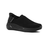 Championes Austral sin cordones, color negro, confeccionados en tejido de punto transpirable. Presentan suela con tecnología Cushion Gel para mayor amortiguación y detalle de marca en el talón.