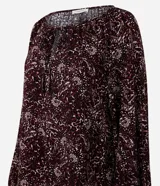 Blusa de viscosa con estampado de follaje, escote canoa con lazo delantero y mangas largas abullonadas.