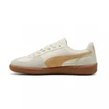 Championes Puma modelo Palermo LTH, de diseño clásico con base de cuero blanco, detalles en gamuza gris y la icónica franja lateral en negro. Presenta una suela de goma color caramelo y el logo de la marca en el lateral.