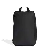 Botinera deportiva Adidas modelo Tiro, color negro con las tres tiras características y logo de la marca en blanco. Cuenta con cierre principal y base reforzada con perforaciones para ventilación.