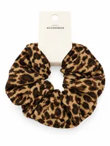 Colero para el pelo con estampado animal print de leopardo en tonos marrones y negros.