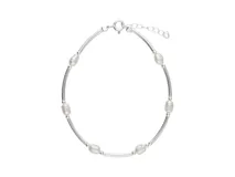 Pulsera de plata 925 con diseño que alterna tubos de plata curvos con perlas de río irregulares.